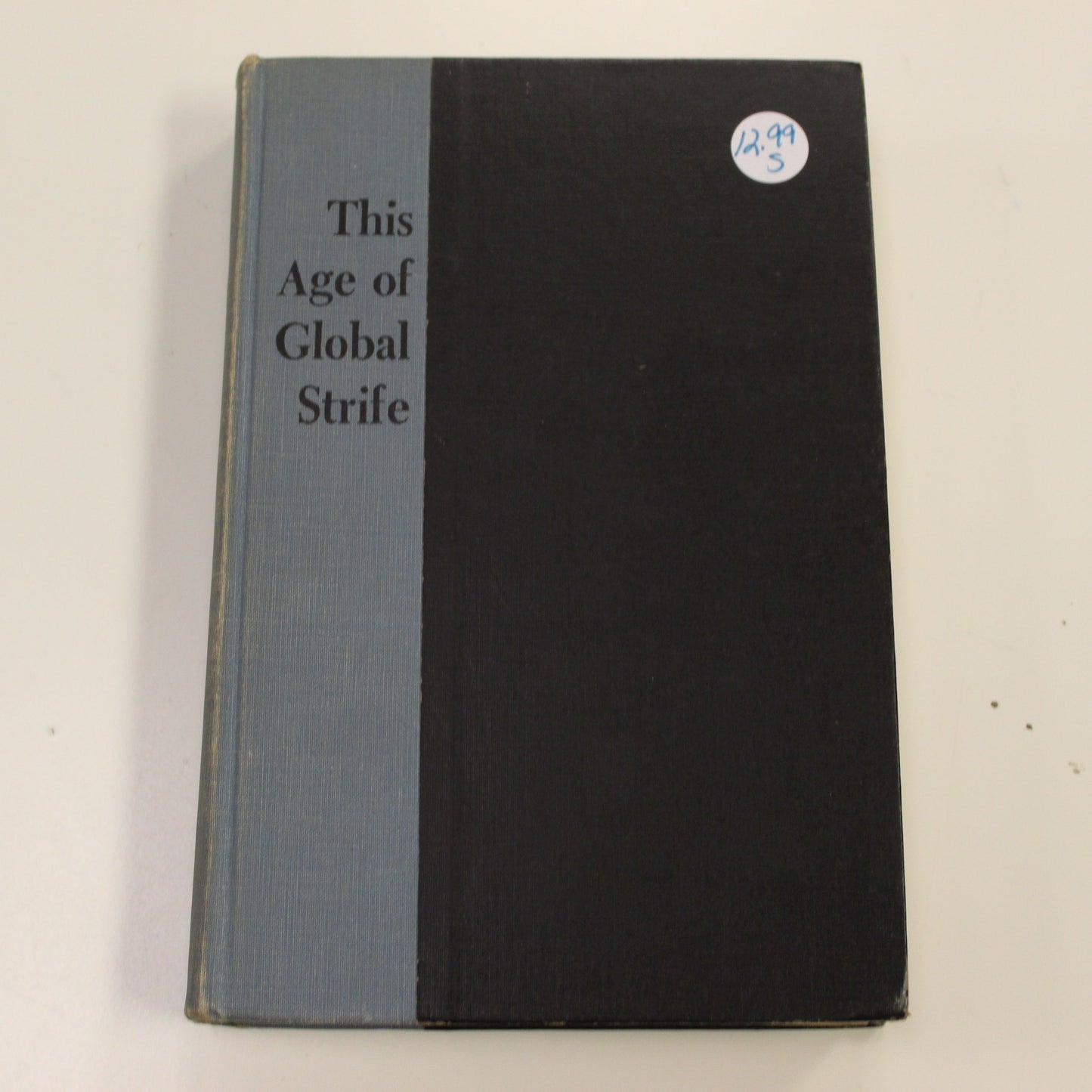 THIS AGE OF GLOBAL STRIFE