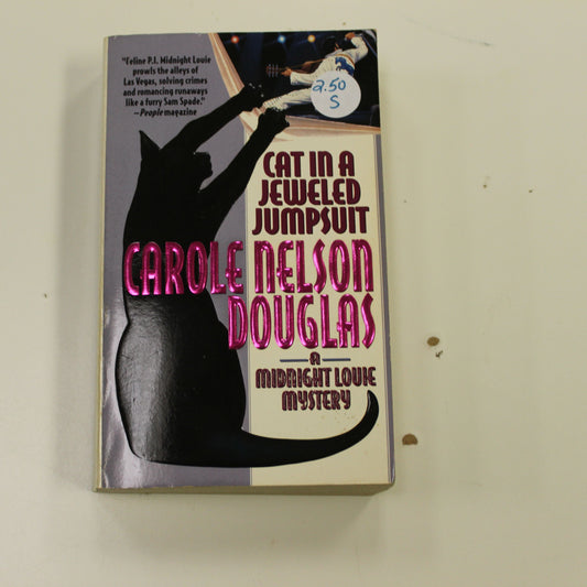 CAT IN A JEWELED JUMPSUIT