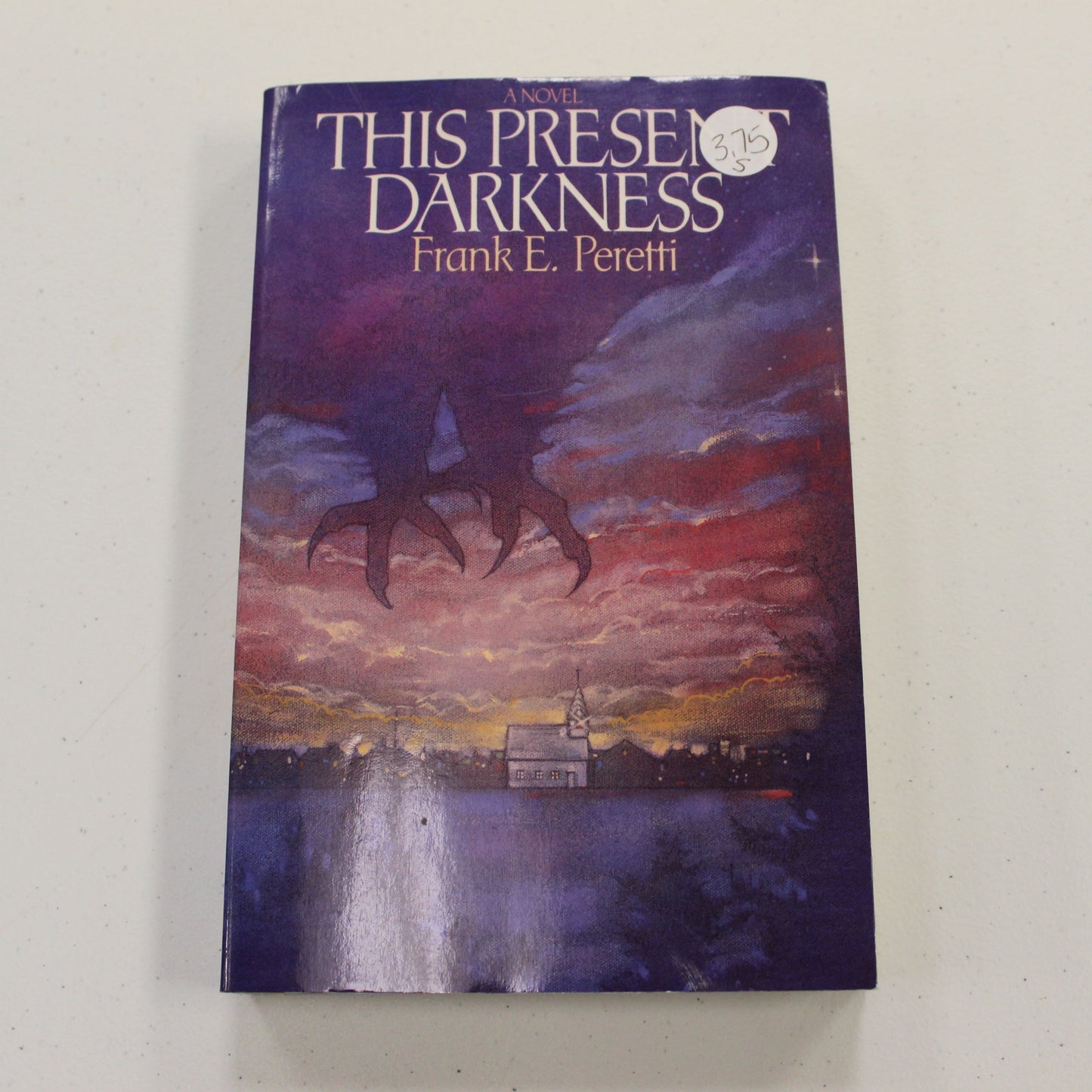THE PRESENT DARKNESS