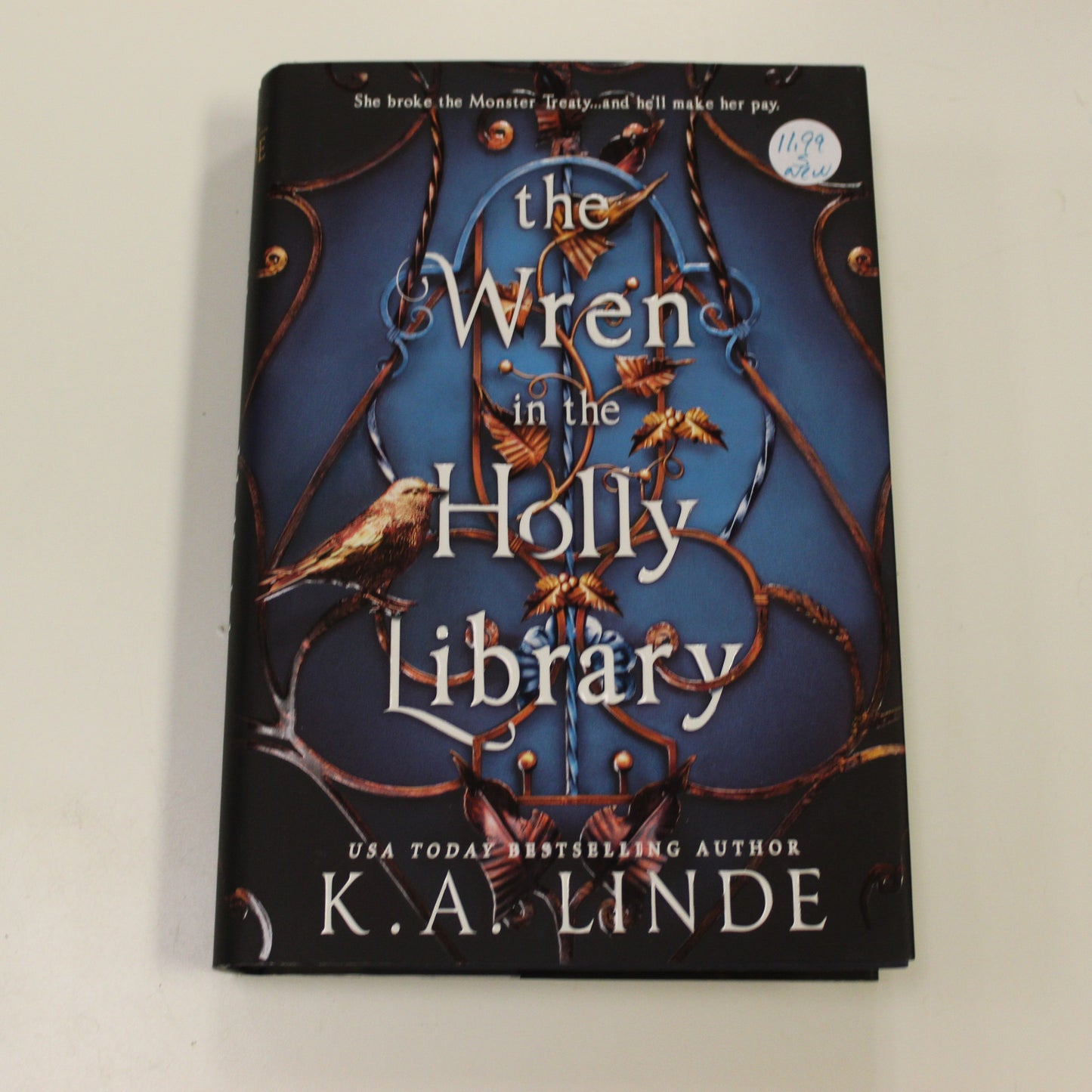 THE WREN IN THE HOLLY LIBRARY